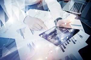 Bank manager working process.Closeup photo trader work market report